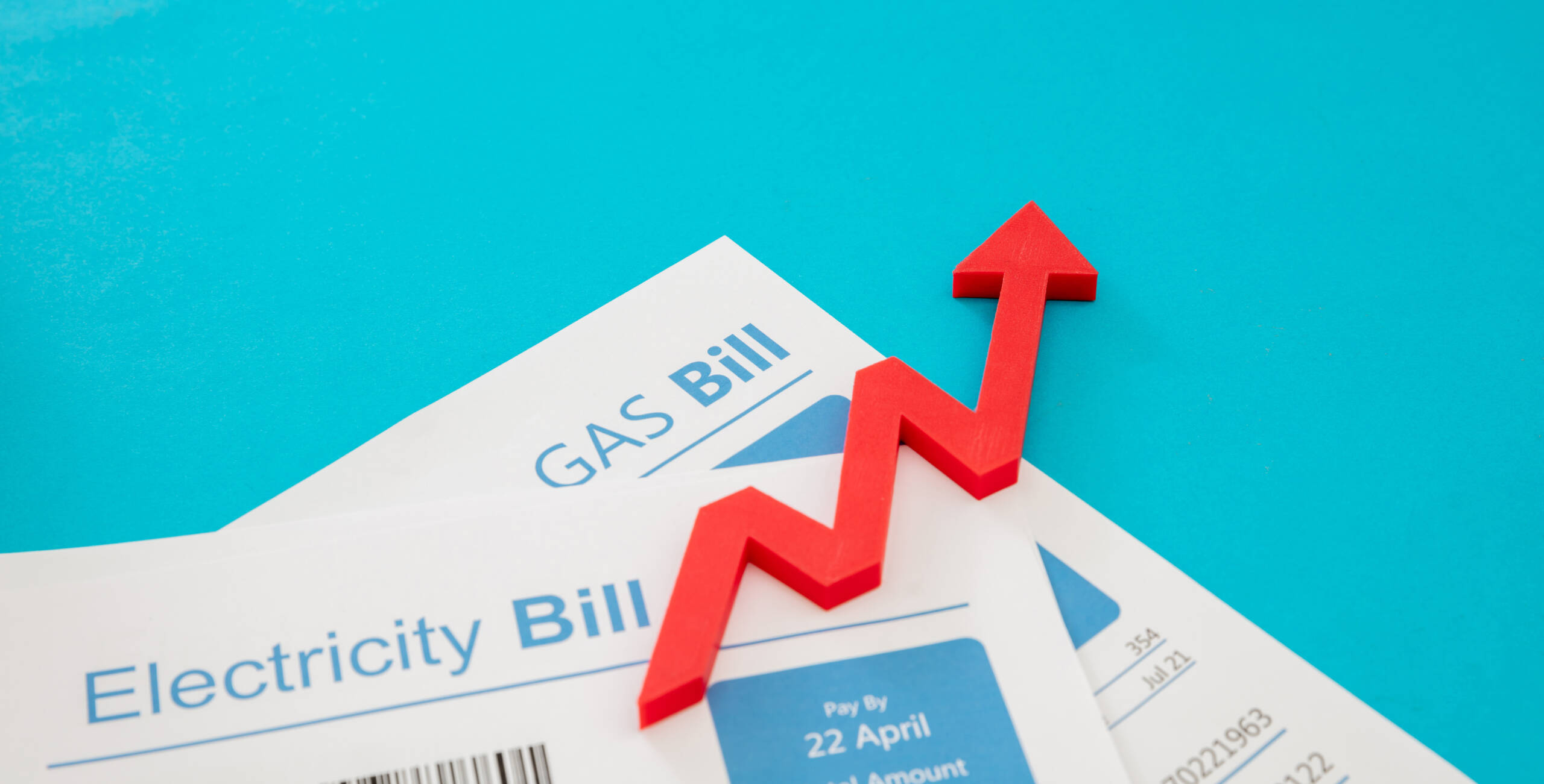 Electricity and gas bills. Heating and energy cost increase concept. Utilities accounts and red rising up arrow.